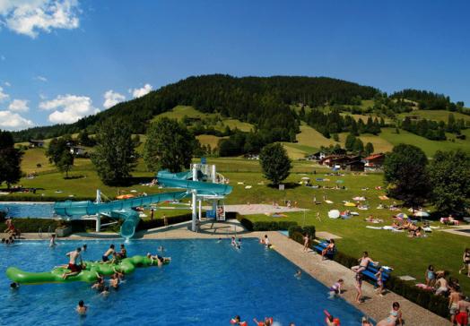 Having fun at the outdoorpool Wildschönau