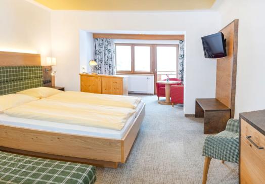 Komfortzimmer Deluxe Morgensonne im Landhotel Tirolerhof in Oberau in der Wildschönau