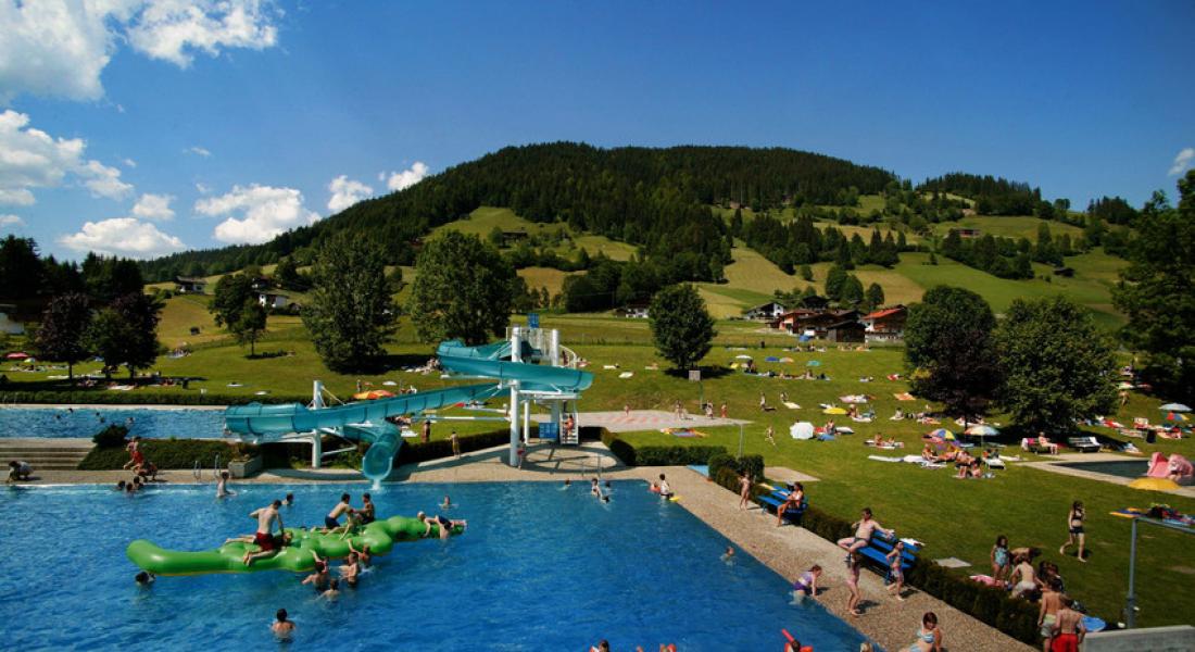 Having fun at the outdoorpool Wildschönau