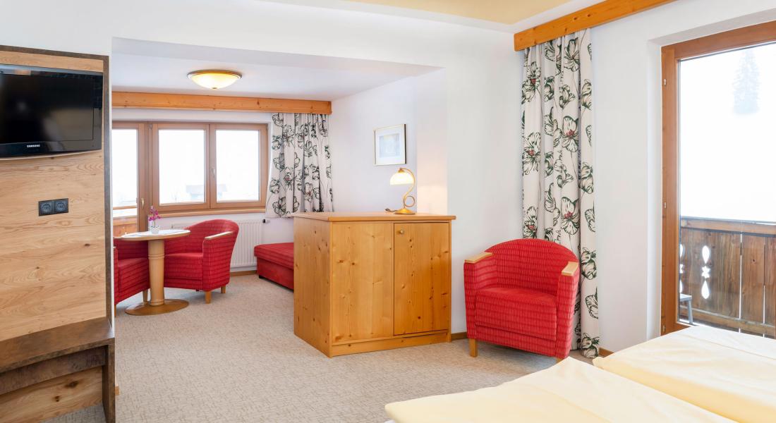 Spacious living and sleeping area in the Rosskopf studio at the Landhotel Tirolerhof in Wildschönau, Tyrol
