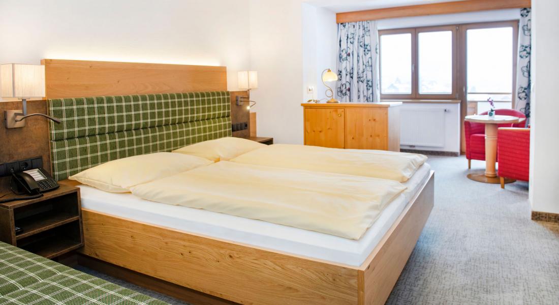 Schlafbereich im Komfortzimmer Deluxe - Landhotel Tirolerhof