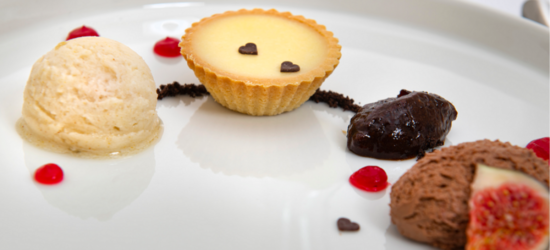 Chocolate meets pear and plum - white chocolate tart, dark chocolate mousse, pear sorbet and plum ragout