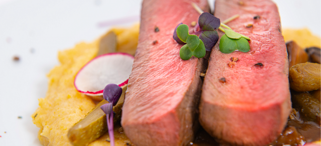 Saddle of venison "Stroganoff" on creamy Parmesan polenta